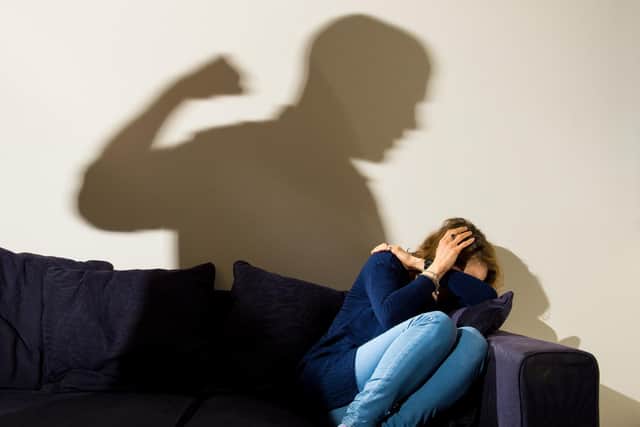 PICTURE POSED BY MODEL File photo dated 09/03/15 of a shadow of a man with a clenched fist as a woman cowers in the corner. Reports of children living in homes affected by domestic abuse have increased more than 30 percent since the start of the pandemic, a charity has said.