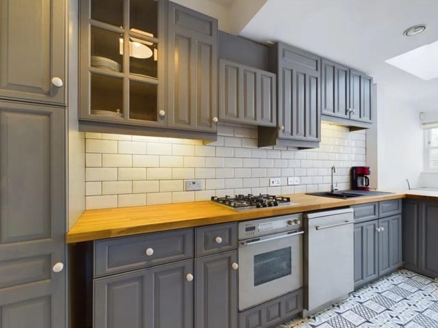 The listing says: "A historically important Grade II listed house that offers gracious living over four storeys comprising 6 double bedrooms, 3 shower/bathrooms, 5 reception rooms and 2 kitchens with an extensive rear courtyard garden, rear access for vehicles and off-street parking in a shared front drive."