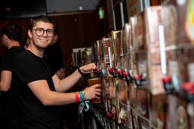 Portsmouth Sausage And Cider Festival 2019, at The Portsmouth Guildhall - Sam Mombar pouring a cider. Picture: Vernon Nash (210919-002)