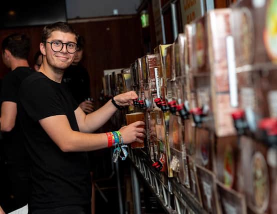 Portsmouth Sausage And Cider Festival 2019, at The Portsmouth Guildhall - Sam Mombar pouring a cider. Picture: Vernon Nash (210919-002)