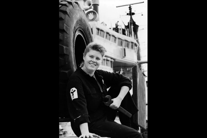 Nikki McCombe (22) a stoker on board HMS Ark Royal when it returned to Portsmouth, 1993. The News PP5437