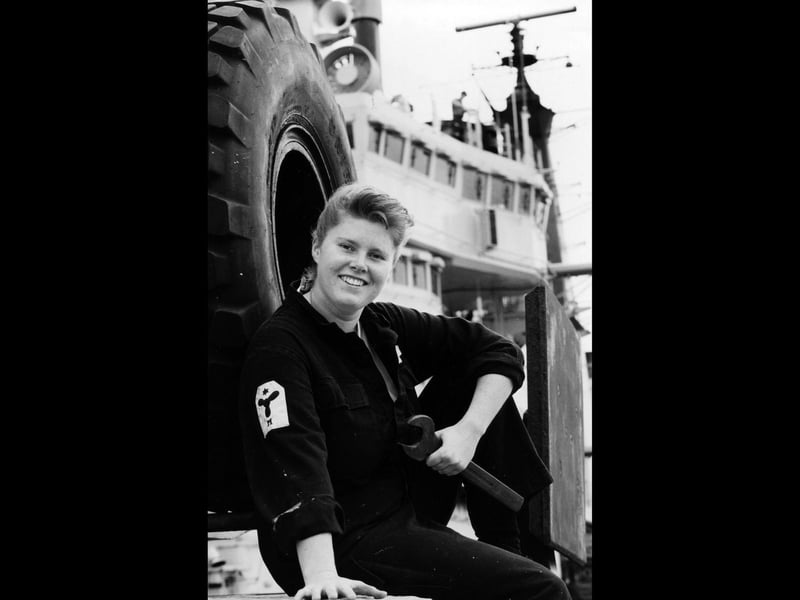 Nikki McCombe (22) a stoker on board HMS Ark Royal when it returned to Portsmouth, 1993. The News PP5437