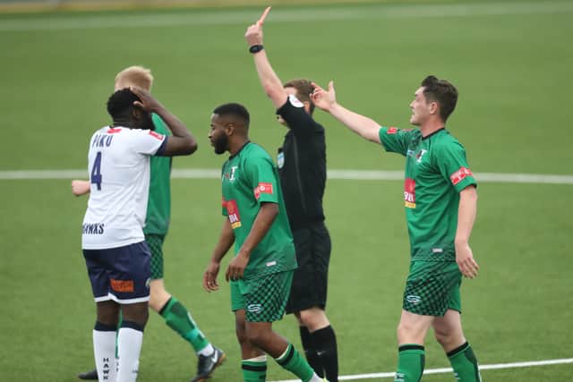 Godfrey Poku is sent off by referee James Durkin. Photo by Dave Haines