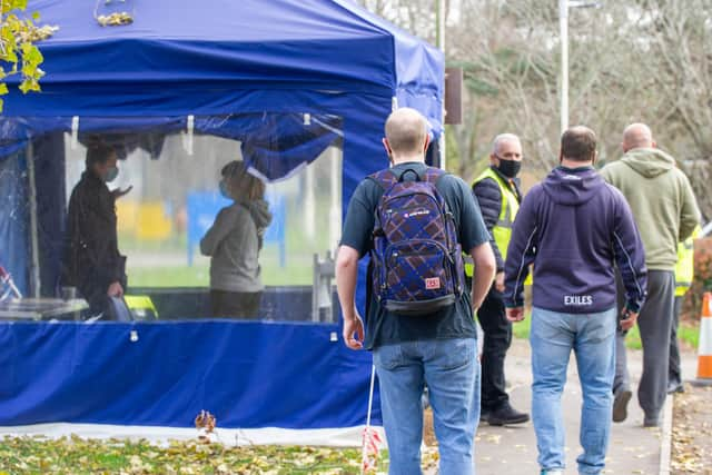 People queuing outside Hamble House vaccination centre, part of the St James' Hospital complex in Portsmouth.

Picture: Habibur Rahman