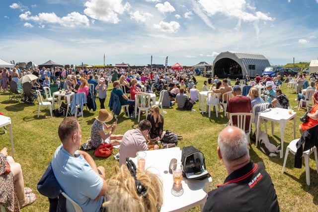 Festival goers enjoying the fantastic weather. Picture: Mike Cooter (210522)