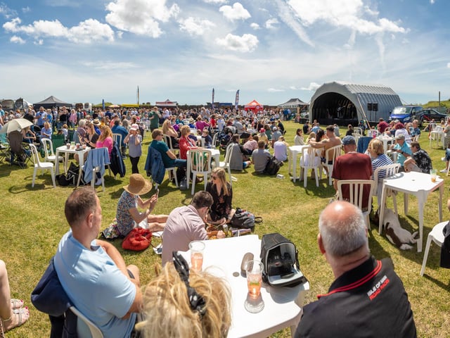 Festival goers enjoying the fantastic weather. Picture: Mike Cooter (210522)