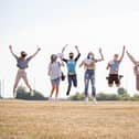 Portsmouth College students jump for joy after being awarded their A-level results.

Picture: Habibur Rahman