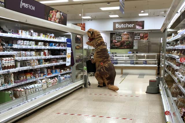 Tesco T RexA mystery man dressed as a Tyrannosaurus rex does his shopping at Tesco, North Harbour, on Tuesday, March 31. Picture: Kirsty Suthers
