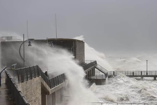 Storm Eunice causing waves to crash against the seafront in Portsmouth. Picture: Alex Shute.