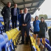 Pompey and Hawks officials - including respective managers Kenny Jackett and Paul Doswell, as well as Pompey Women boss Jay Sadler and some of his players - at Westleigh Park. Pic: Kieron Louloudis.