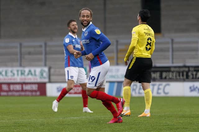Marcus Harness celebrates his second - a cheeky backheel - during today's hat-trick in Pompey's 4-2 win at Burton. Picture: Daniel Chesterton/phcimages.com