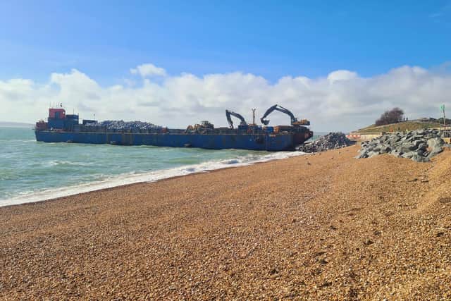Diggers busy unloading the new rock for the sea defences near Southsea Castle. Picture: Alex Yorke