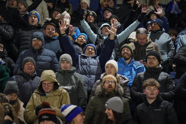 Pompey fans had to wrap up warm at Wycombe's Adams Park.