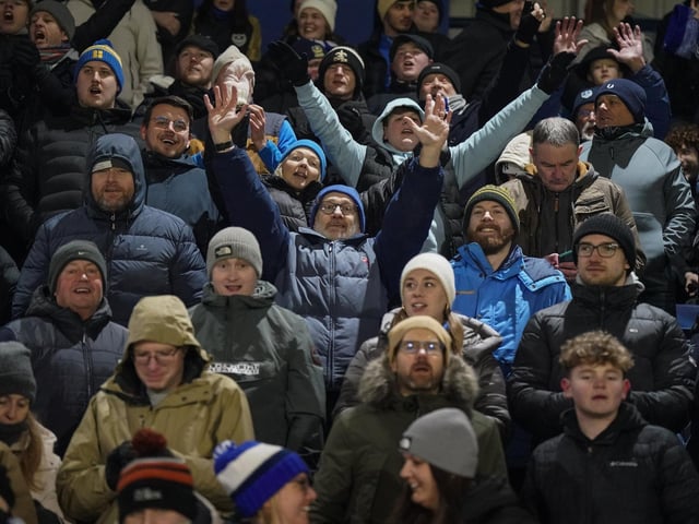 Pompey fans had to wrap up warm at Wycombe's Adams Park.