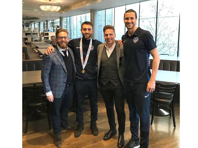 Agents Phil Korklin (far left) and Brian Howard (second right) pose with clients Ben Close and Christian Burgess after the 2019 Checkatrade Trophy final