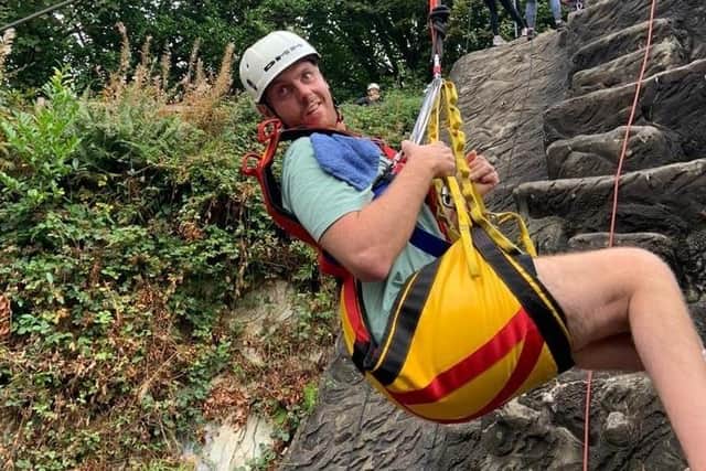 Jack Farrugia, who can't talk, eat, or swallow, plans to abseil down Spinnaker Tower, raising money for his friend Josh, who has a similar severe brain injury. Picture: Laurence Farrugia.