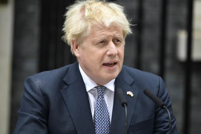 Prime Minister Boris Johnson reads a statement outside 10 Downing Street, London, formally resigning as Conservative Party leader after ministers and MPs made clear his position was untenable. He will remain as Prime Minister until a successor is in place. Picture date: Thursday July 7, 2022.