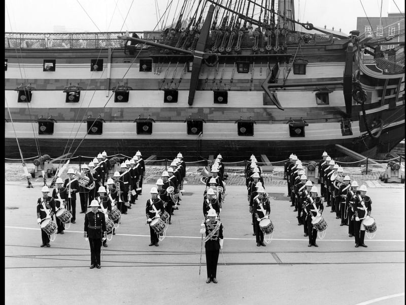 Royal Marine Band of the Commander in Chief Naval Home Command alongside HMS Victory in Her Majesty's Naval Base, Portsmouth, 1982.The News PP5161