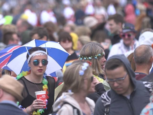 Festival goers brave the wet weather during the 2019 Isle of Wight Festival at Seaclose Park, Newport. Picture: Ed Lawrence/PA Wire
