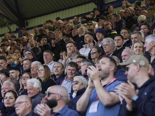 Pompey fans played a big role in carrying their team to a massive three points in their Championship survival battle against Blackburn Rovers.