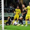 Dane Scarlett watches a first-half attempt flash across the face of goal during Pompey's trip to Burton. Picture: Simon Davies/ProSportsImages