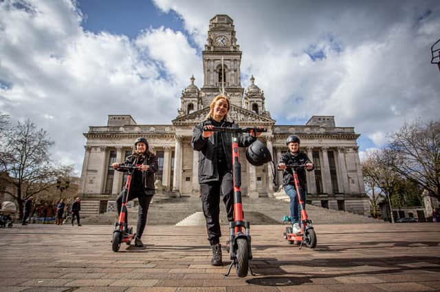 The e-scooter rental trial launched in Portsmouth last week.

Pictured: Voi scooter team, Jon Hamer, Maria Sassetti and Nikolina Kotur on the e-scooters at Portsmouth Guildhall walk on 15 March 2021.
Picture: Habibur Rahman
