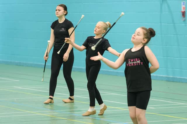 Twirl-Versity Academy of Baton & Dance members practice at Cowplain School.

Picture: Keith Woodland