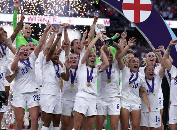 England players celebrate with the trophy following victory over Germany in the UEFA Women's Euro 2022 final at Wembley Stadium, London. Picture date: Sunday July 31, 2022.