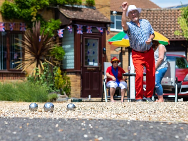 Peter Rogerson, 70, provided entertainment for his neighbourhood street party in Swallow Court, Lee-on-the-Solent, by giving over his driveway for games of boules