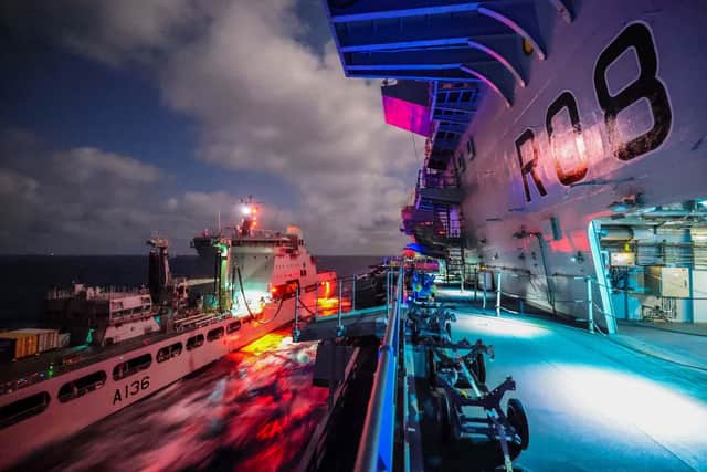 RFA Tidespring refuelling HMS Queen Elizabeth during the aircraft carrier's mission to the Far East