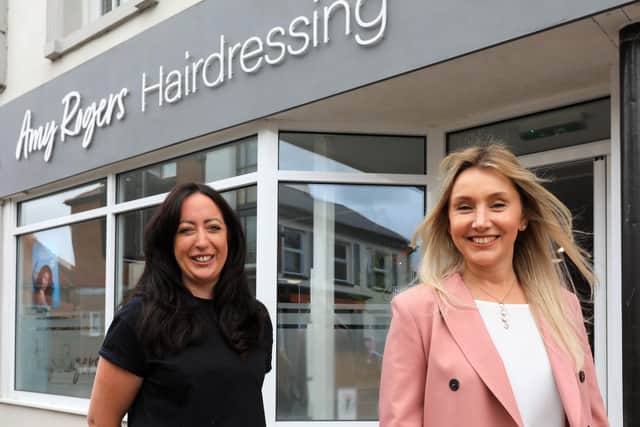 Ukrainian hairdresser Lilya Kulynych has a new life in the UK where she is working in Amy Rogers' salon in Stoke Road, Gosport. She is pictured wih Amy Rogers, left 
Picture: Chris Moorhouse (jpns 290622-13)