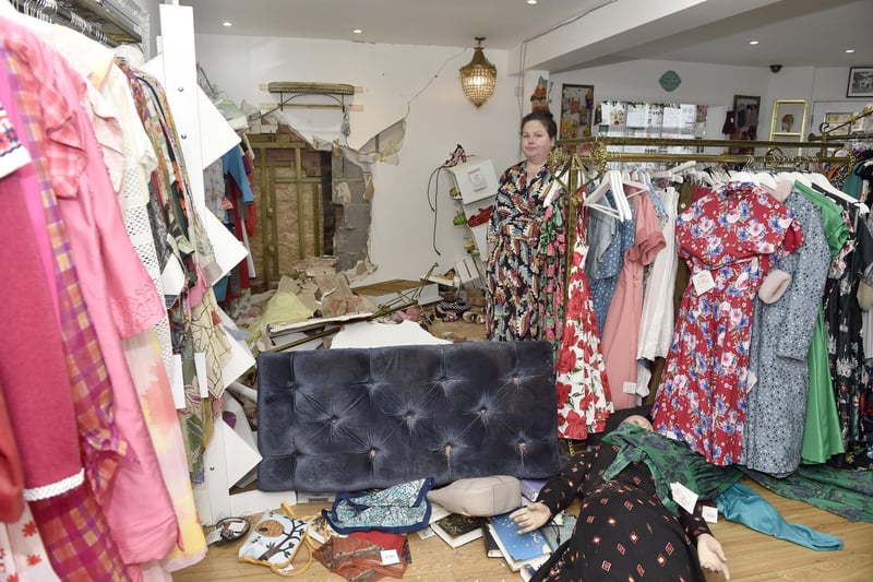 Damage to Voluptuous Vintage shop and a residential property next door in Village Road, Alverstoke, where a two-car collision took place and three people have been arrested.

Pictured is: Owner of Voluptuous Vintage in Village Road, Alverstoke, Jennifer Darling (47).

Picture: Sarah Standing (110124-4596)
