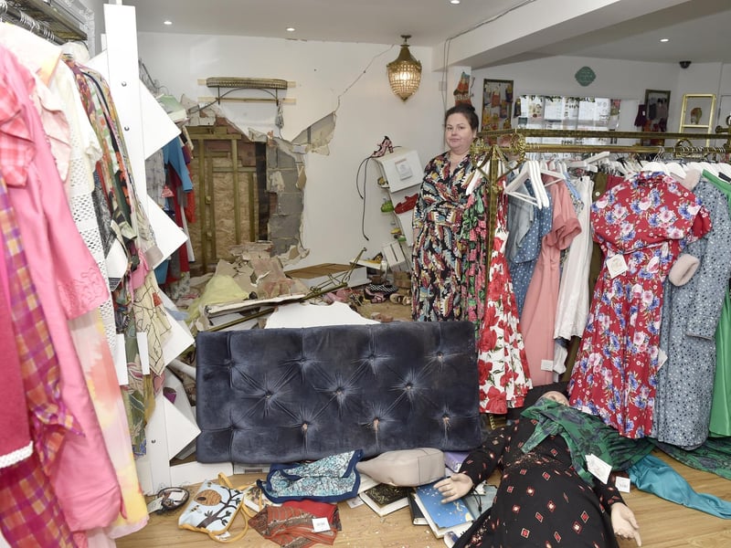 Damage to Voluptuous Vintage shop and a residential property next door in Village Road, Alverstoke, where a two-car collision took place and three people have been arrested.Pictured is: Owner of Voluptuous Vintage in Village Road, Alverstoke, Jennifer Darling (47).Picture: Sarah Standing (110124-4596)