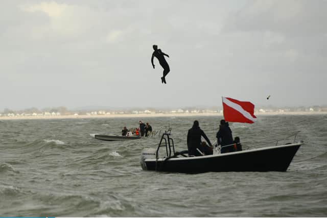 Pictured: John Bream about to land in the water after jumping from the aircraft.

© Ewan Galvin/Solent News & Photo Agency
UK +44 (0) 2380 458800