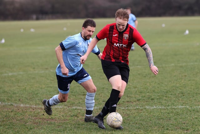 Portchester Rovers (blue) v Horndean United. Picture: Sam Stephenson