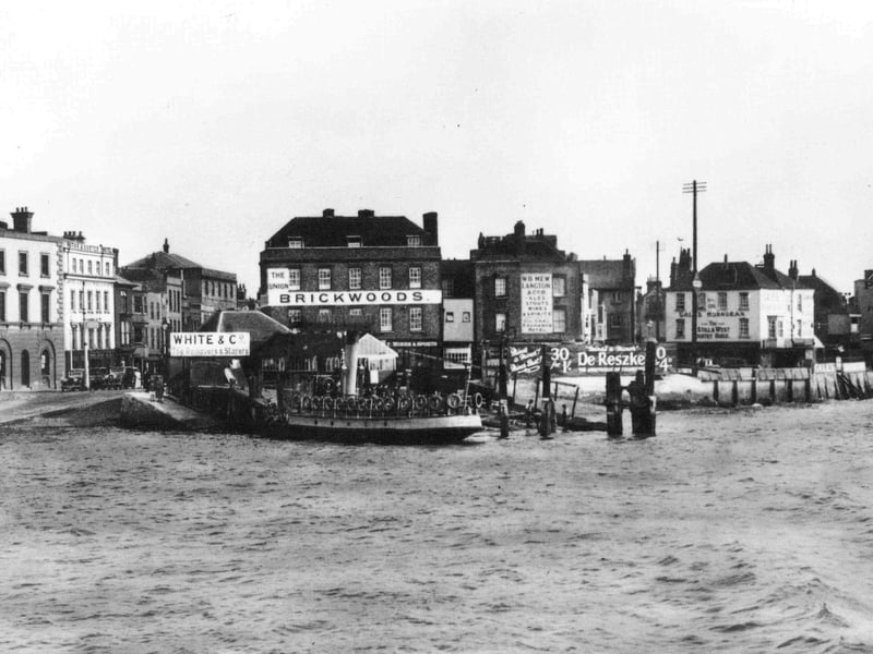Point Old Portsmouth.
Sent in by K. Gill of Alexander Road, Landport, we see what is always termed these days as 'Spice Island' by the tourist bods.
This is a much changed scene with all the buildings to the left demolished. The Brickwoods pub The Union is now called The Spice Island Inn although the white building to the right, the Gales owned Still and West still operates under the same name.
In the centre, Mew Langton were a brewers located at 83, High Street.
To the left can be seen the railway owned car ferry to the Isle of Wight. The notice states: Southern Railway Motor Car Ferry Service - Portsmouth to Fishbourne