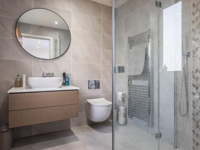 This property comes with four bedrooms, three bathrooms and three reception rooms as well as a lovely garden.