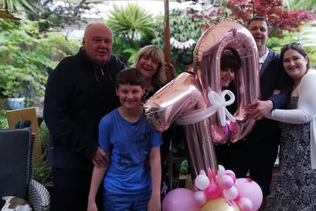 Nick and his family. Ali is on the right.