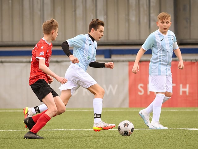 Action from the Portsmouth Youth League Geldard Invitation Cup final between Jubilee 77 U13s and Castle United U13s (light blue and white kit). Picture: Keith Woodland (190321-643)