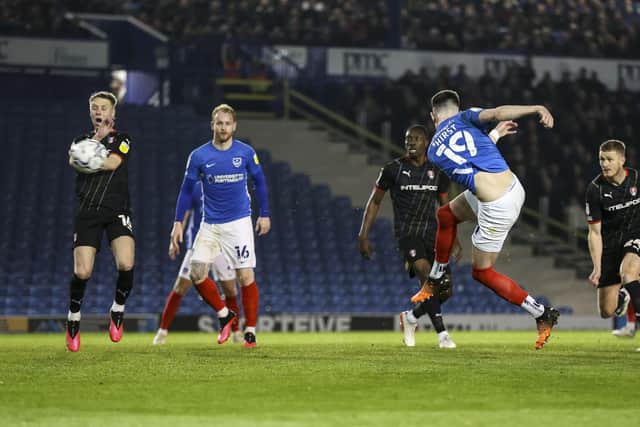 George Hirst rifles home Pompey's third against Rotherham last night - and his 11th of the season. Picture: Robin Jones - Digital South