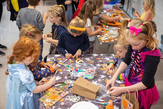 A busy craft session preparing for Halloween at the Final Straw event. Picture: Mike Cooter (281021)