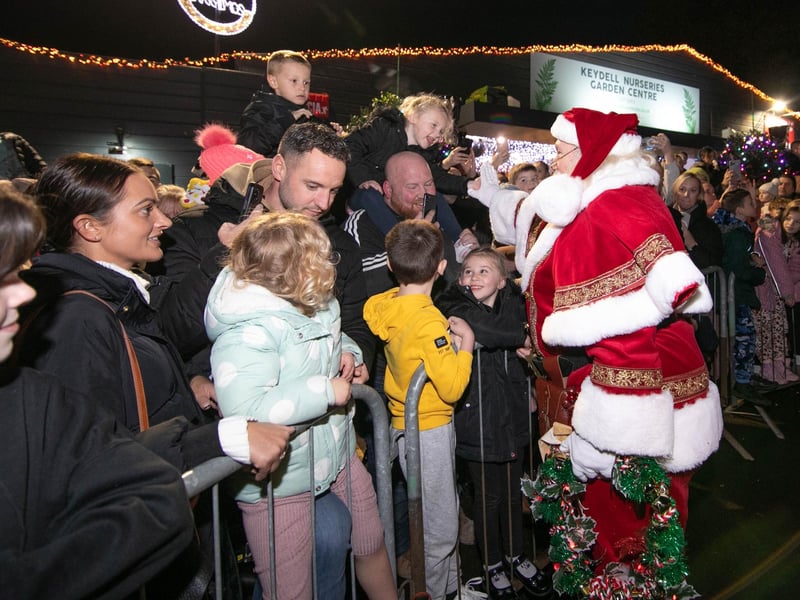 Father Christmas meeting the visitors.