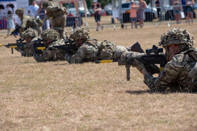 Armed Forces Day Portsmouth - The PWRR Reserve demonstrate a dry fire attack  Picture: Vernon Nash (180399-025)