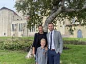 The Queen's funeral is being screened at St Mary's church on Monday 19th September 2022 Pictured: Nicole and Nathan Geddis with son Jack Geddis outside Portsmouth Cathedral.