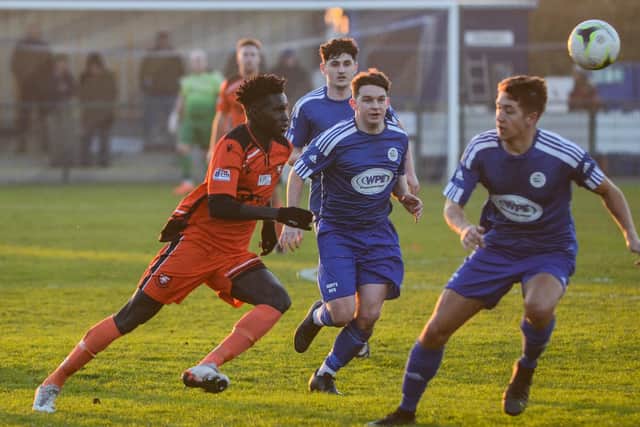 AFC Portchester striker Lamin Jatta in pursuit of the ball against Portland. Picture: Daniel Haswell