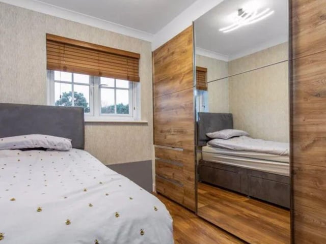 The listing says: "This eye-catching family home offers a spacious four bedroom, two bathroom layout extending to 1564 sq. Ft., enhanced by generous off-road parking with in-and-out driveway, plus a detached studio in the rear garden, perfect for home working or a versatile hobby space."