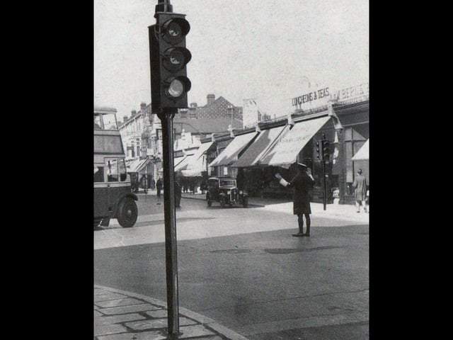 Portsmouth's first set of traffic lights on the corner of Elm Grove and Grove Road, Southsea, in 1933