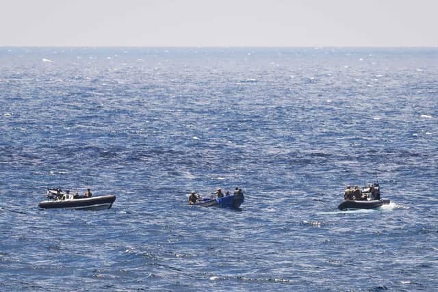 The drugs vessel being surrounded. Picture: LPhot Gareth Smith/Royal Navy