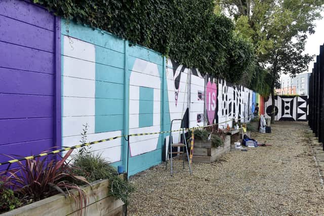 Community interest groups and young people rallied around the project to create a symbol of love and acceptance in Portsmouth. Picture: Sarah Standing (010923-7771)