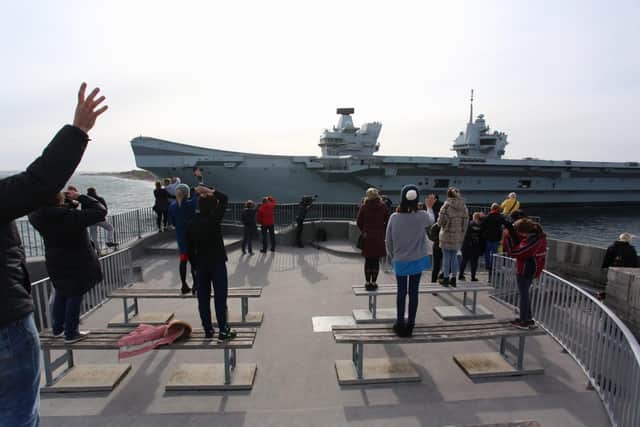 Crowds gather at The Round Tower to watch HMS Queen Elizabeth depart from Portsmouth on April 29. Photo: Habibur Rahman